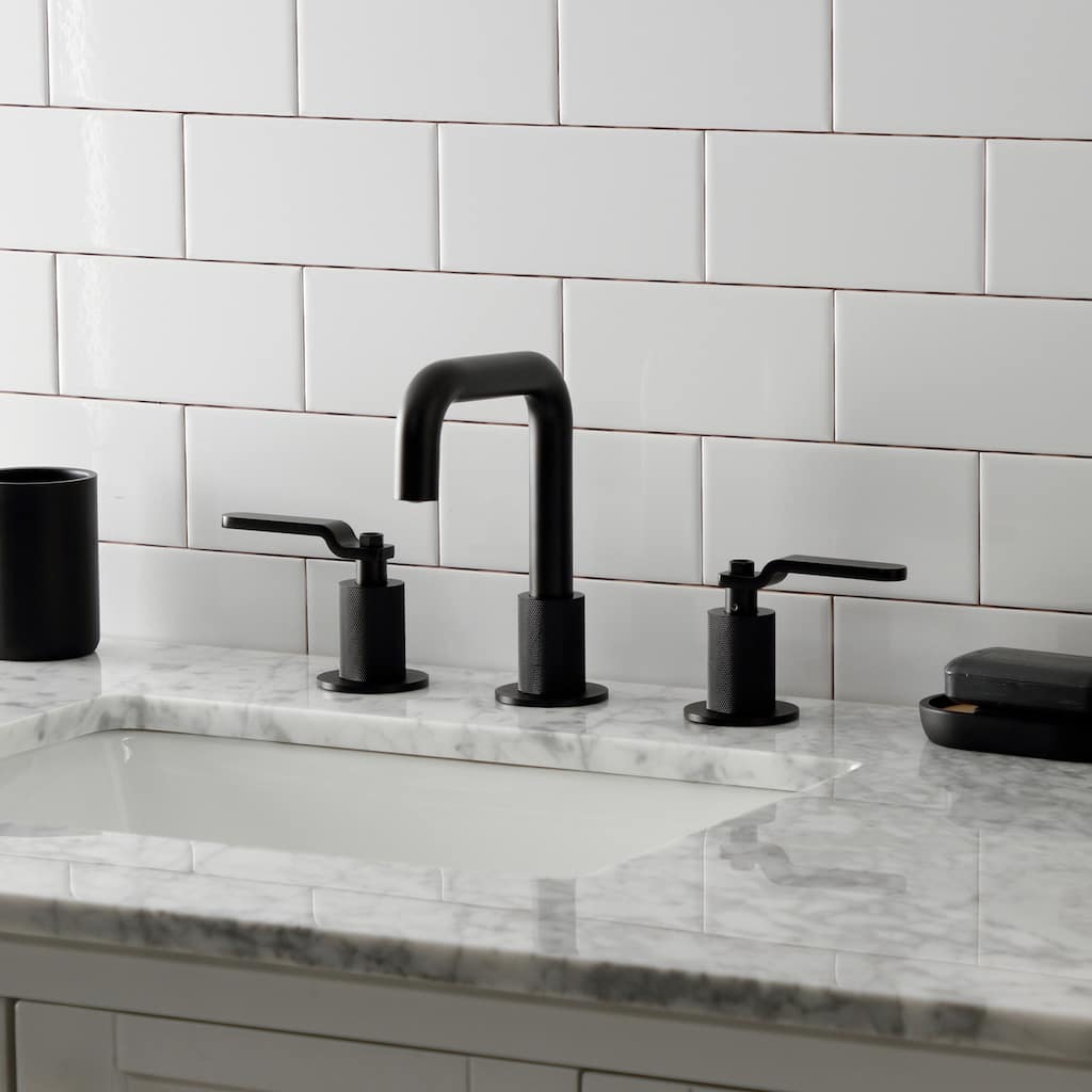 Kingston Brass Whitaker Two-Handle 3-Hole Deck Mount Widespread Bathroom Faucet with Push Pop-Up