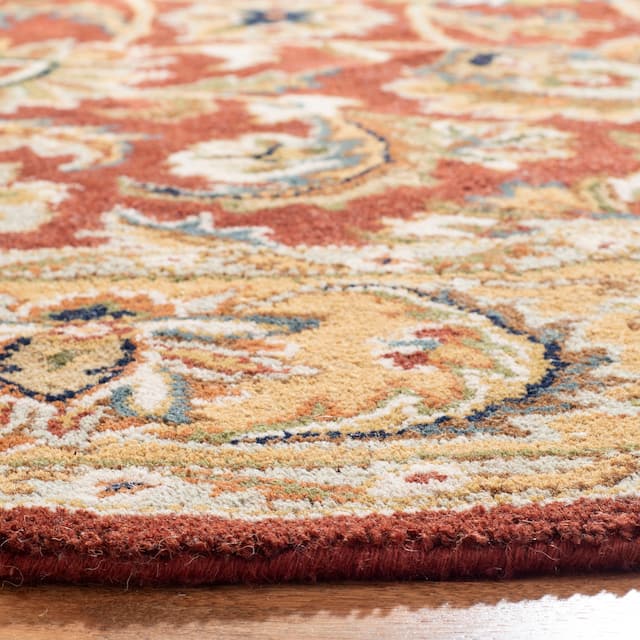 SAFAVIEH Handmade Classic Clotilda Traditional Oriental Wool Rug - 7'6" x 9'6" Oval - Rust/Camel
