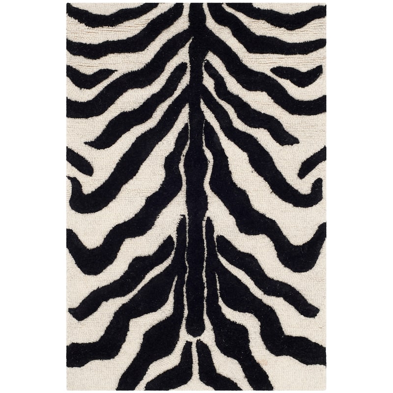 SAFAVIEH Handmade Cambridge Rikey Animal Print Wool Rug - 2' x 3' - Ivory/Black