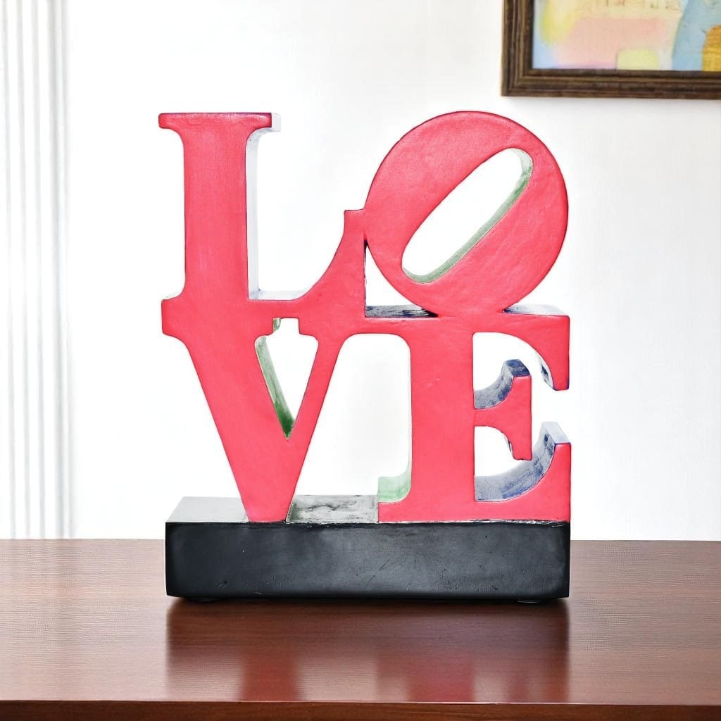 HomeRoots 4" Red Blue Green And Black Resin Love Tabletop Sculpture - 3.50 in. x 4.00 in. x 1.50 in.
