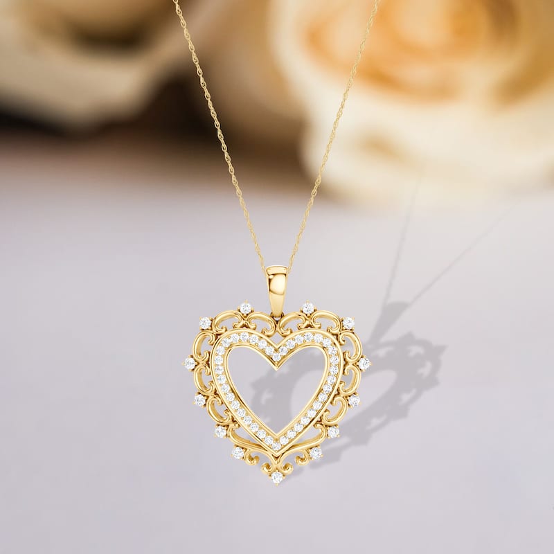 1/4ct TDW Diamond Filigree Heart Pendant Necklace in 10K Yellow Gold for Women