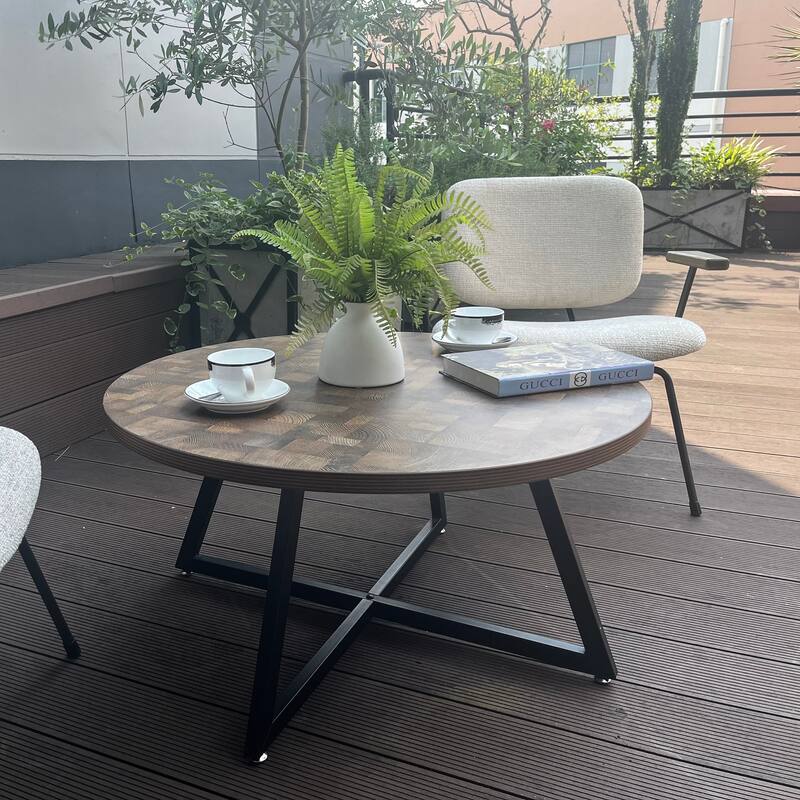 Round Coffee Table with Wood Grain and Black Metal, a Stylish and Functional Centerpiece for Your Living Space.