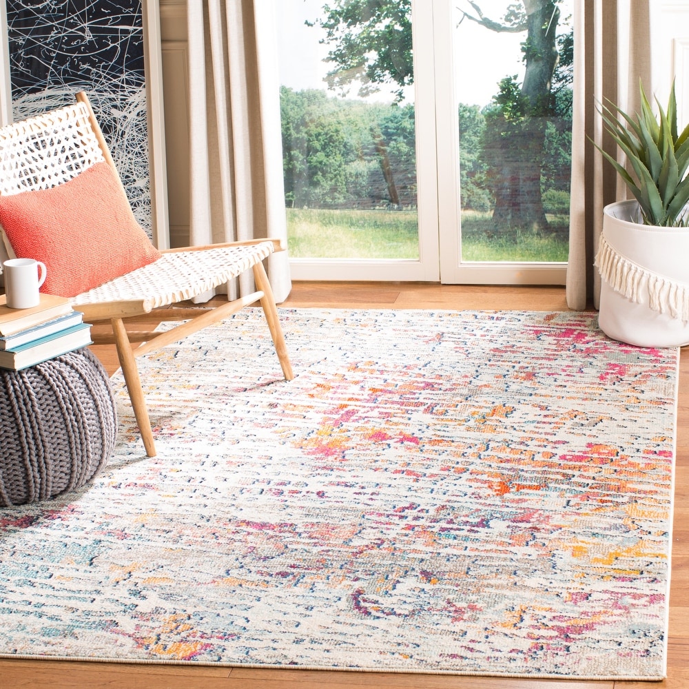 https://ak1.ostkcdn.com/images/products/is/images/direct/7c3861af98cfde4dc58ea0815456a6815e1f9686/SAFAVIEH-Madison-Geeke-Vintage-Boho-Abstract-Rug.jpg