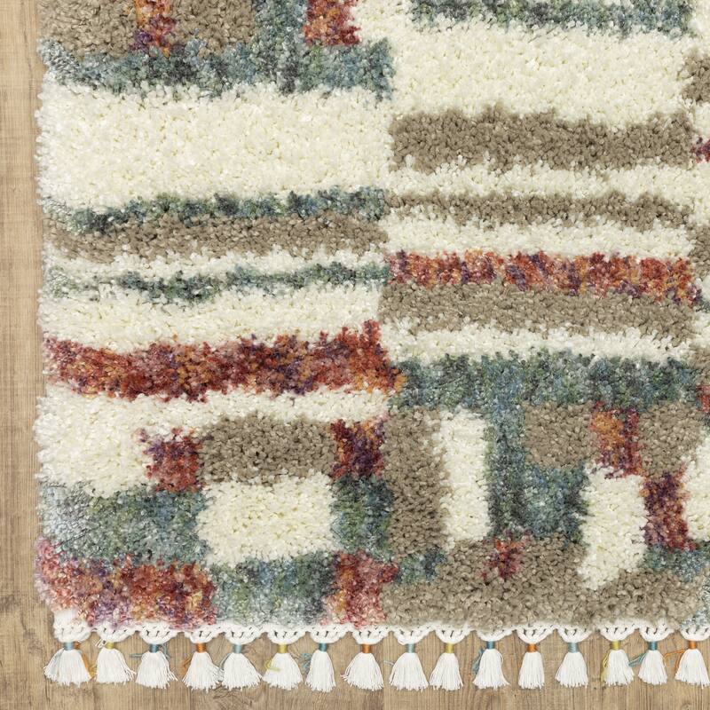 Style Haven Aire Abstract Stripe Ivory/ Multi Shag Tassel Fringe Area Rug.