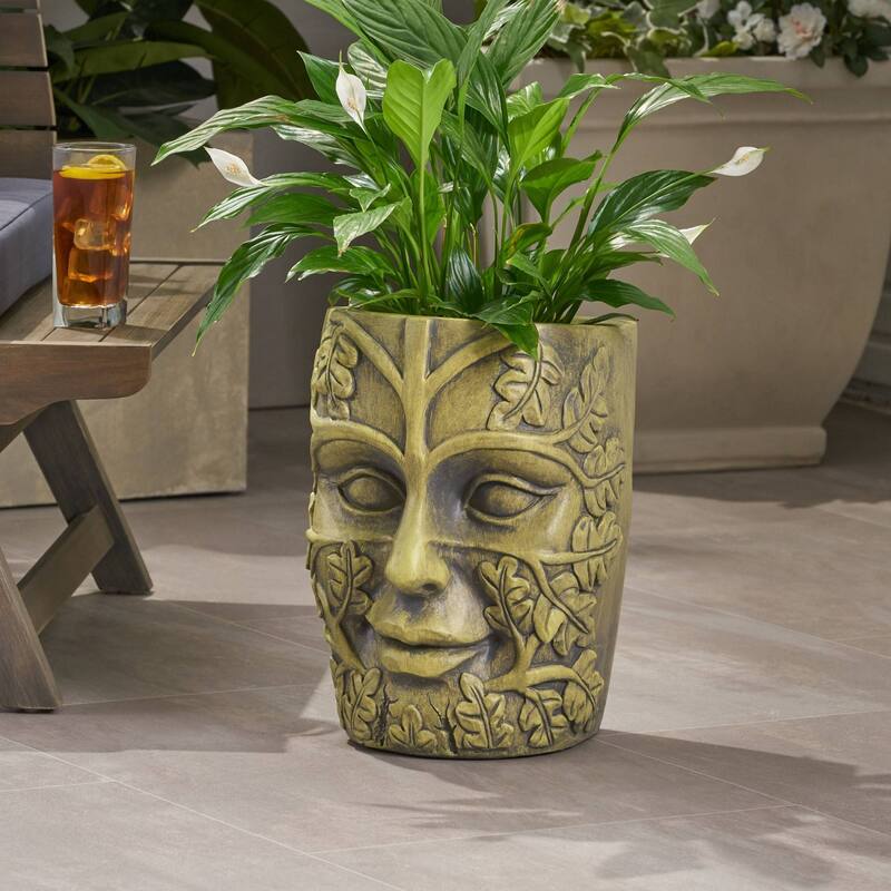 Outdoor stone statue planter with drainage hole, suitable for garden and patio.