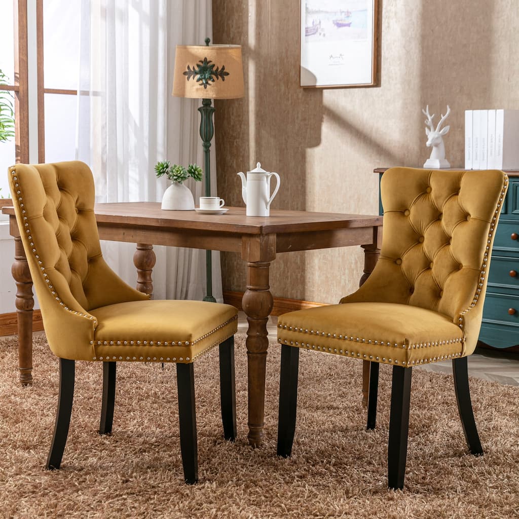 Contemporary Velvet Upholstered Dining Chair with Solid Wood Legs and Nailhead Trim, Offering Luxurious Comfort and Style.