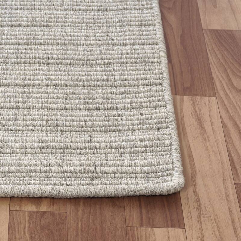Sevita Solid Casual Hand-Woven Woolen Area Rug