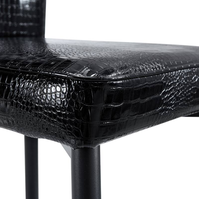 A set of 2 vintage crocodile leather cushioned dining chairs, featuring crystal clasp design and artificial leather design