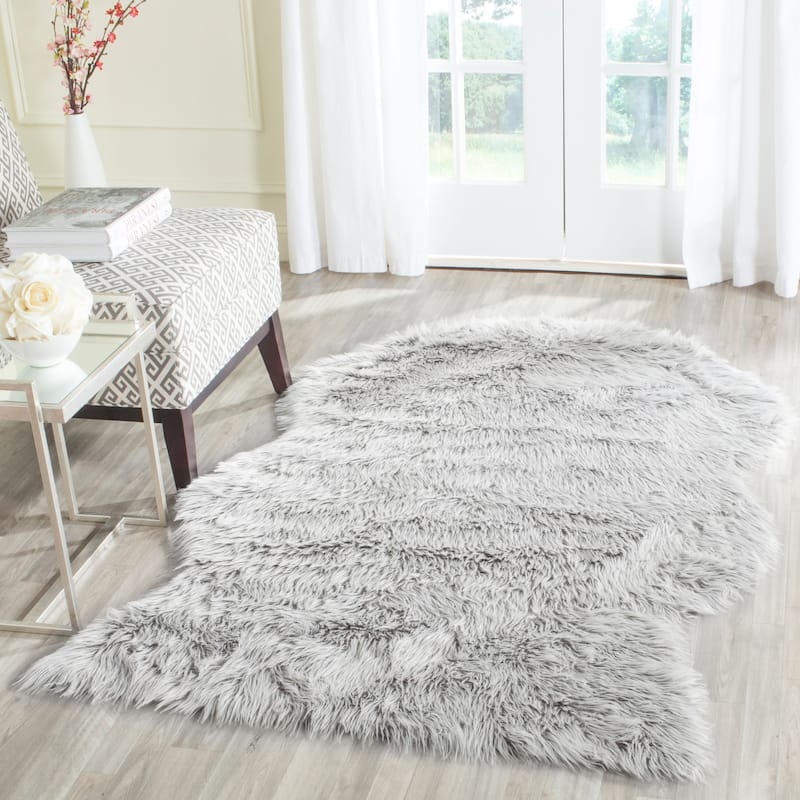 SAFAVIEH Faux Sheep Radena Christen Shag Solid Rug - 4' x 6' - Light Grey