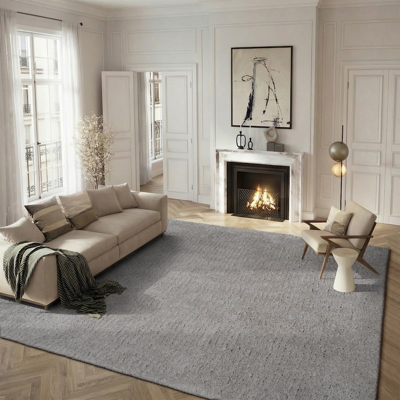 SAFAVIEH Handmade Ryann Shag Anneclaar Solid Polyester Rug