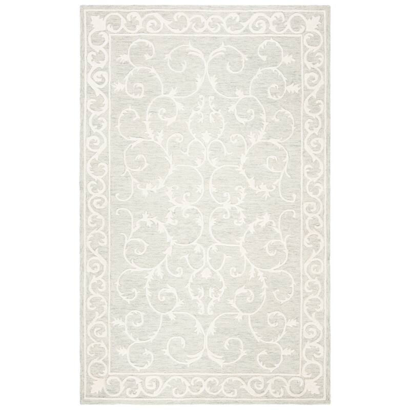 SAFAVIEH Handmade Micro-Loop Tomke Wool Rug