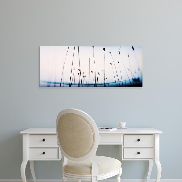 Easy Art Prints Panoramic Images's 'Flags on the ghat, Ganges River, Varanasi, Uttar Pradesh, India' Canvas Art