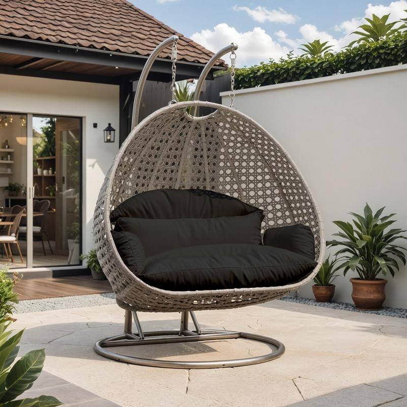 LeisureMod Modern 2-Person Egg Hanging Swing Chair with Beige Wicker, Oxford Fabric Cover, Patio Hammock Lounger and Cushions
