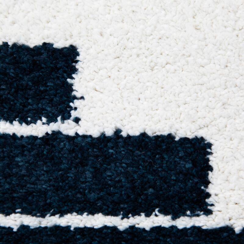 Carson Carrington Salsaker Geometric Area Rug