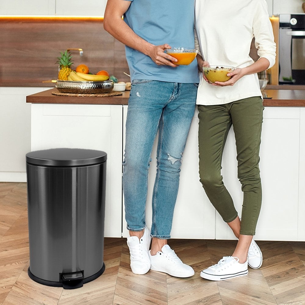 https://ak1.ostkcdn.com/images/products/is/images/direct/7d6140ac10cb6812407aab02303bbe441ab5ef38/10.5-Gallon-Trash-Can-Stainless-Steel-Oval-Kitchen-Step-Trash-Can.jpg
