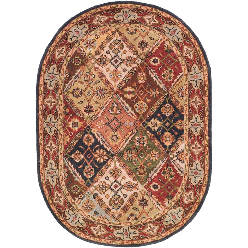 SAFAVIEH Handmade Heritage Chiseko Traditional Oriental Wool Rug - 4'6" x 6'6" Oval - Green/Red
