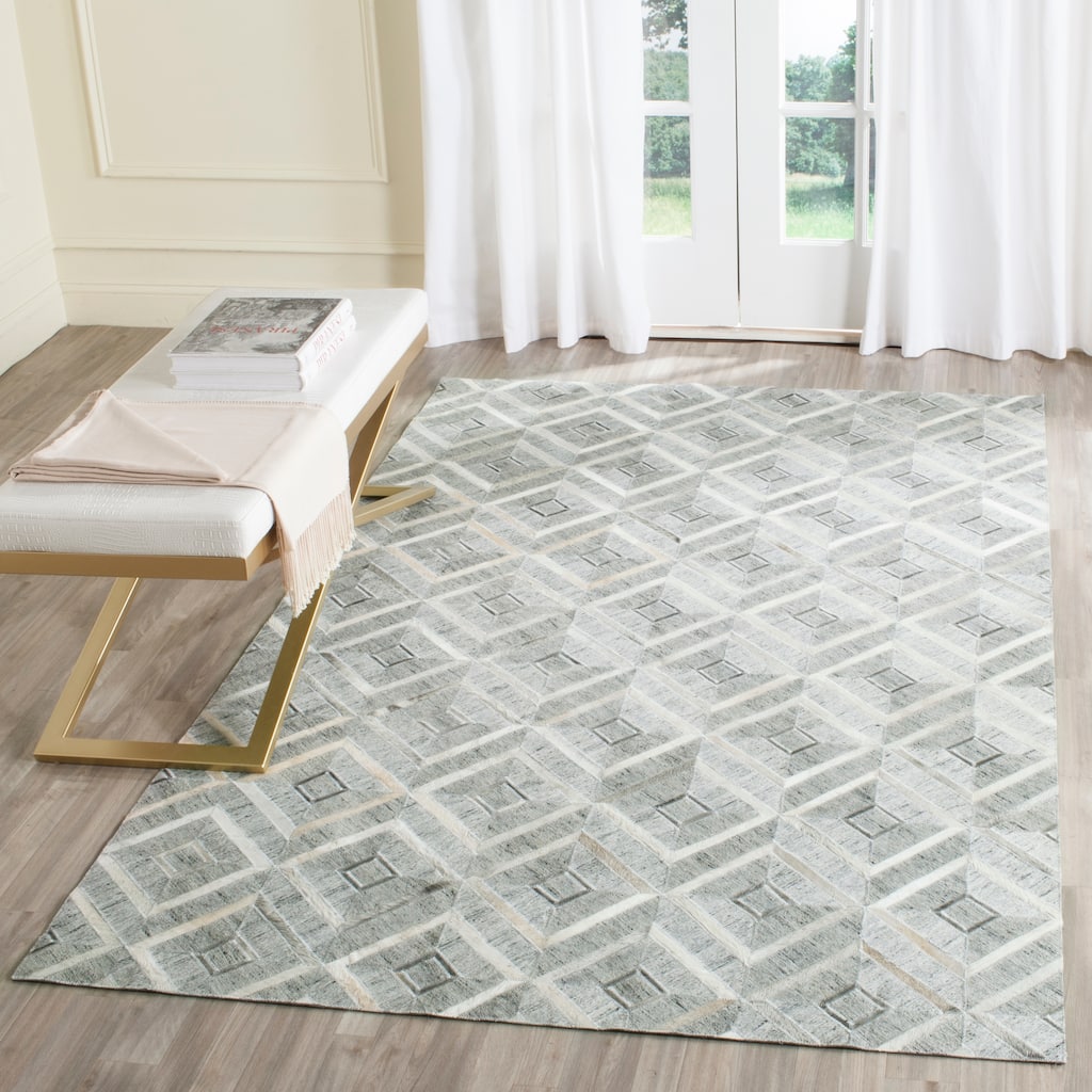 SAFAVIEH Handmade Studio Leather Meggan Modern Leather Rug