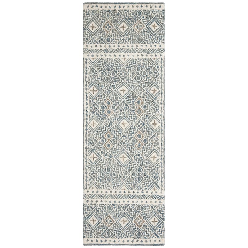 SAFAVIEH Handmade Micro-Loop Jelske Wool Rug