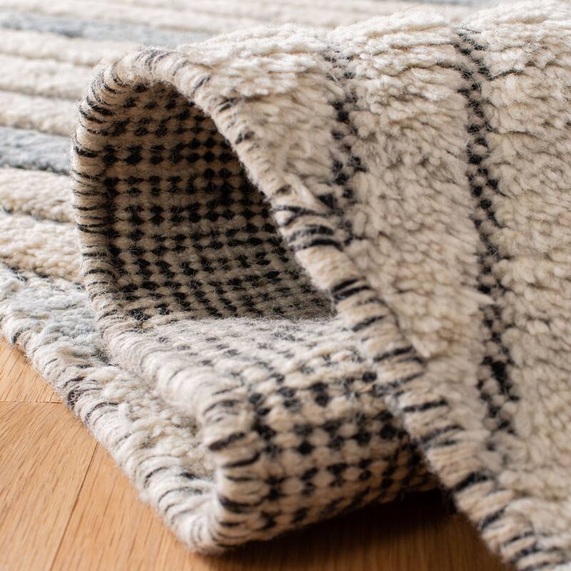 SAFAVIEH Hand-Knotted Casablanca Shag Aurane Tribal Wool Rug
