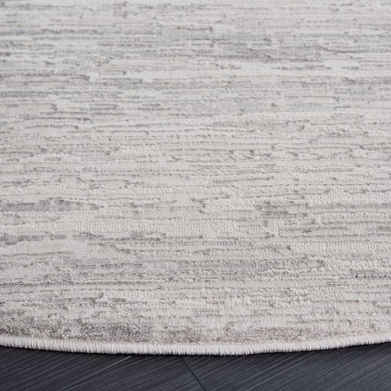 SAFAVIEH Diamond Einfrid Modern Abstract Fringe Rug