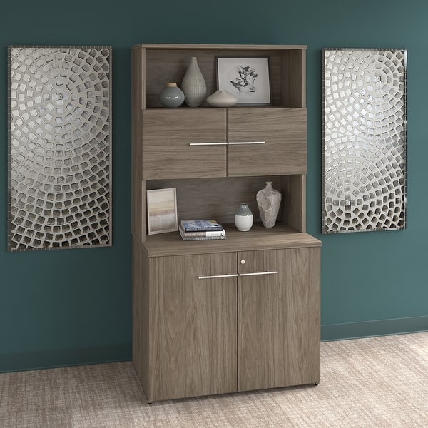 https://ak1.ostkcdn.com/images/products/is/images/direct/7e850a3df3bf19fbf10be2df28329b6f662cd27a/Office-500-Tall-Storage-Cabinet-with-Doors-by-Bush-Business-Furniture.jpg?impolicy=medium