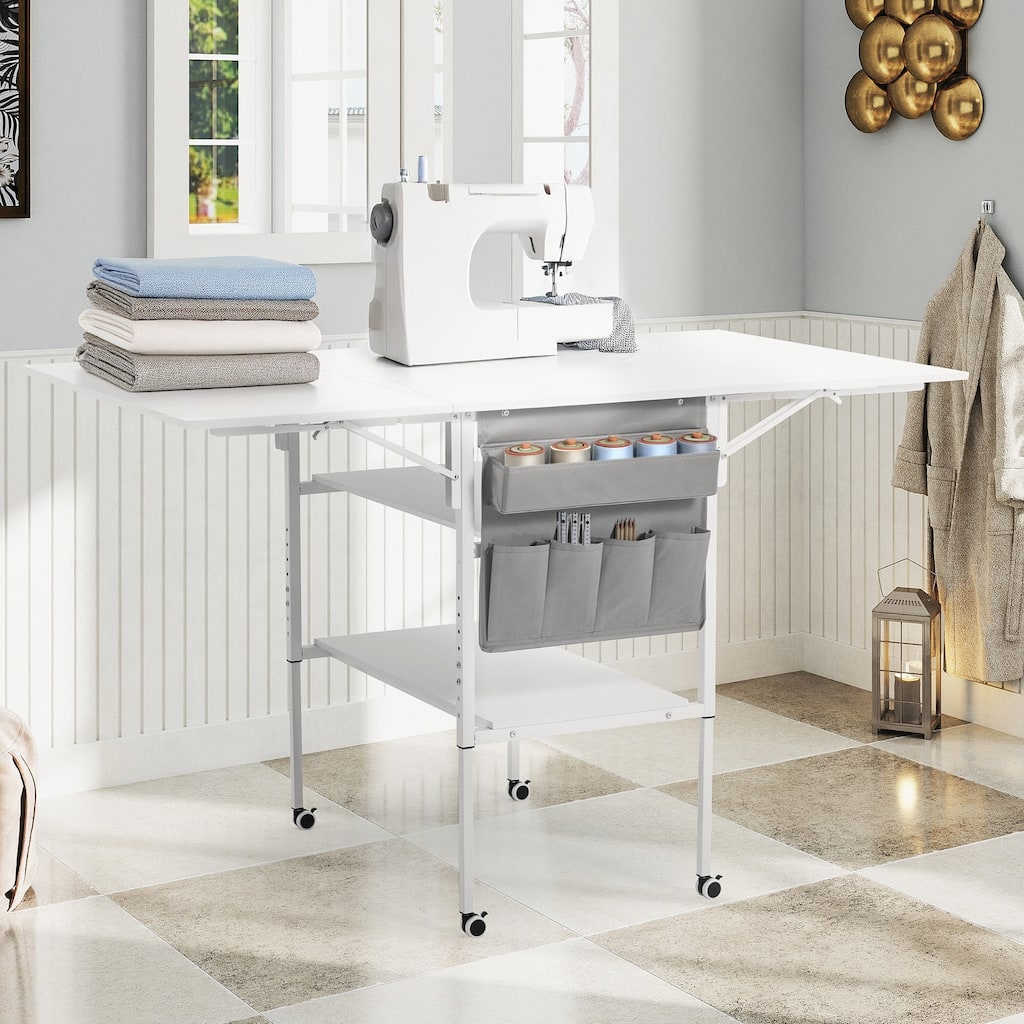 Foldable Craft Table with Storage Portable craft table with adjustable height, two shelves, and a side pocket for storage