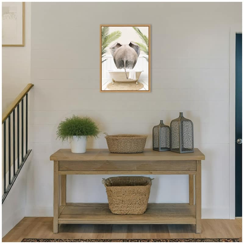 Kate and Laurel Sylvie Elephant Back in Palm Bathtub Framed Canvas by Amy Peterson