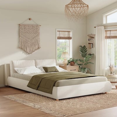 Luxurious Upholstered Platform Bed with Versatile Pillows and Graceful Headboard