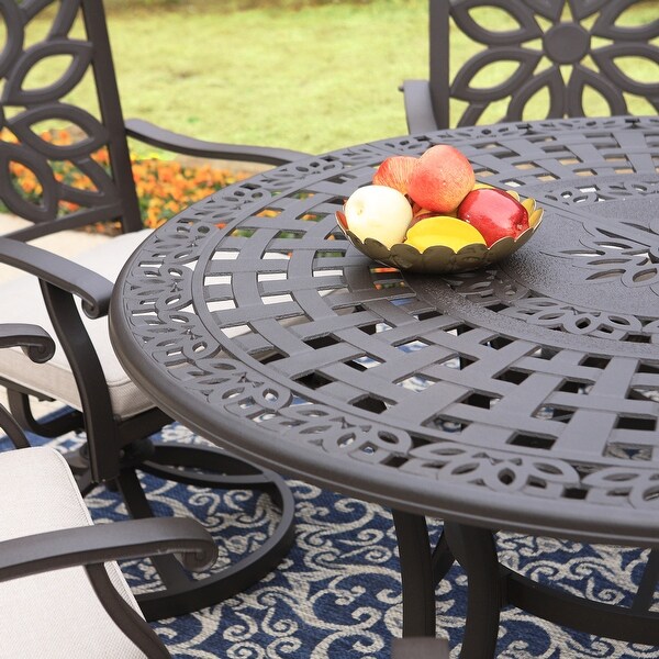 round cast iron patio table and chairs