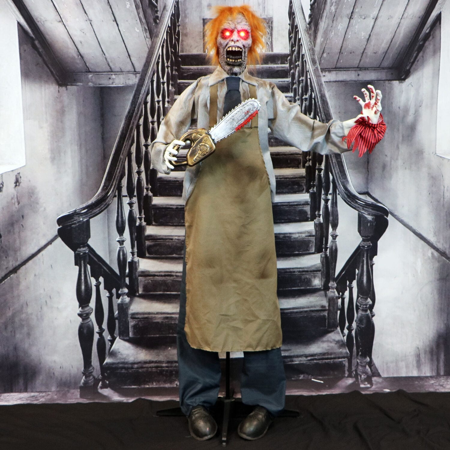 Haunted Hill Farm Animatronic Zombie Carver with Movement, Sound, and Light-Up Eyes for Scary Halloween Decoration