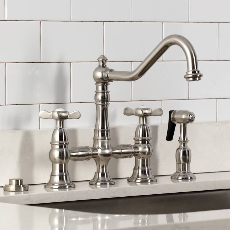 Kingston Brass Essex Two-Handle 4-Hole Deck Mount Bridge Kitchen Faucet with Brass Side Sprayer