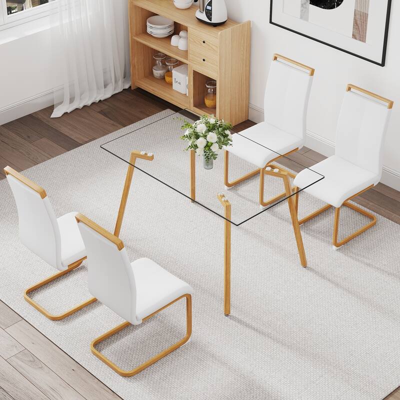 Table and chair set. 1 table and 4 white chairs. Glass dining table