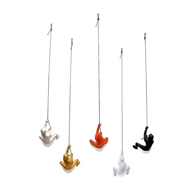 HomeRoots Set of Five Black Gold Orange Silver And White Resin Climbing Man Hanging Dimensional Sculpture