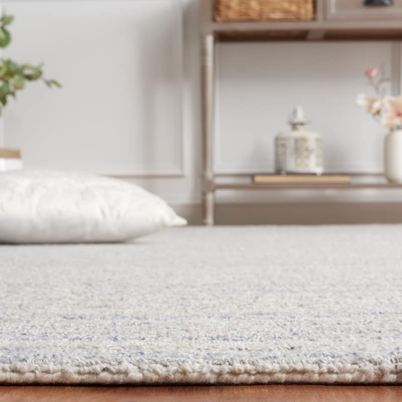 SAFAVIEH Handmade Ebony Cesarina Modern Wool Rug