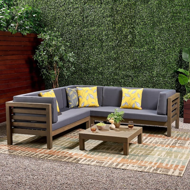 Oana Outdoor 5 Seater V Shaped Mid-Century Modern Acacia Wood Sectional Sofa Set with Coffee Table by Christopher Knight Home