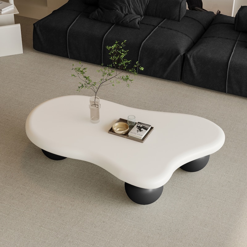 47 Inch Cloud Shaped Coffee Table with 3 Ball Legs for Living Room