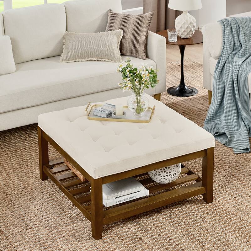 Coffee table with tufted linen upholstery