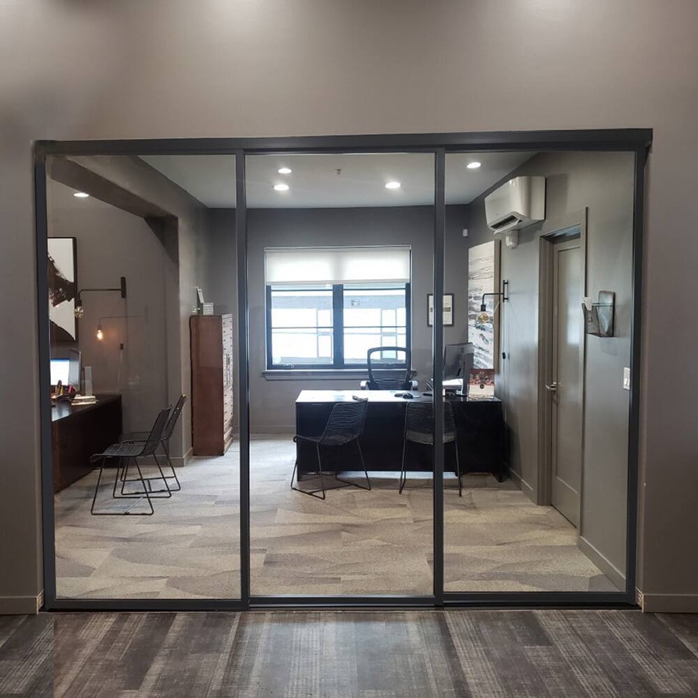 THE SLIDING DOOR COMPANY 3 Panel, Sliding Room Divider, Clear Glass and Aluminum Frame on triple track.