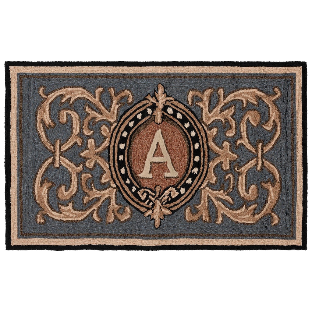 SAFAVIEH Handmade Monogram Irmengard Casual Rug