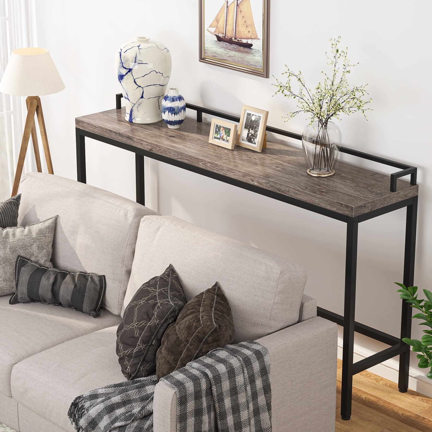 Narrow table behind sales sofa