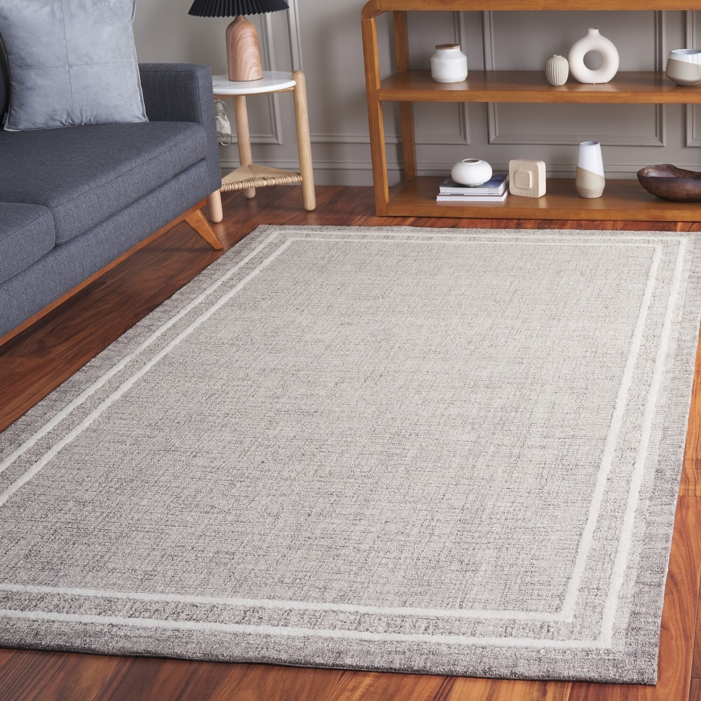 SAFAVIEH Handmade Ebony Gosselke Modern & Contemporary Wool Rug