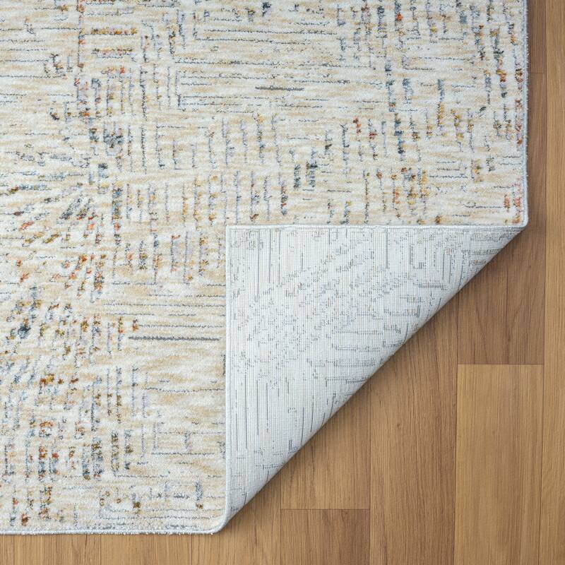 Reeves Modern Abstract Beige Performance Indoor Area Rug by Sevita