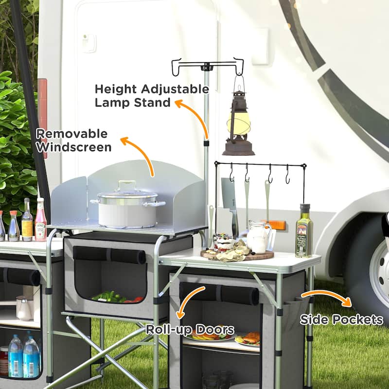 Outsunny Camping Kitchen Table, Portable Folding Camp Kitchen, Aluminum Cook Station with 3 Fabric Cupboards, Windshield