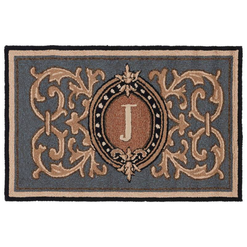 SAFAVIEH Handmade Monogram Griseldis Casual Rug