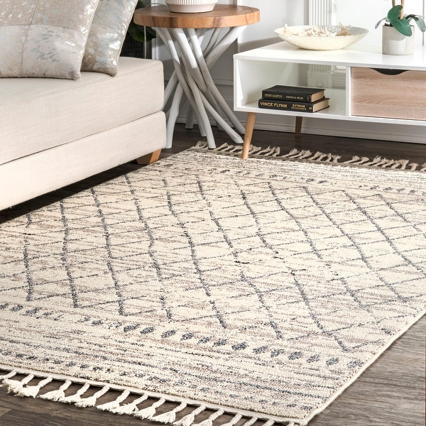 The Curated Nomad Ashbury Ivory Moroccan Diamond Stripe Fringed Area Rug. Opens flyout.
