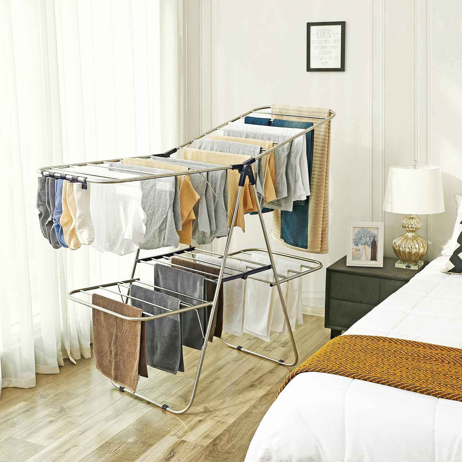 https://ak1.ostkcdn.com/images/products/is/images/direct/8046087374b1ceaa2a7b535bde57695b76fc36ee/SONGMICS-2-Level-Clothes-Drying-Rack%2C-Stainless-Steel-Laundry-Rack-with-Height-Adjustable-Wings%2C-Free-Standing-Laundry-Stand.jpg