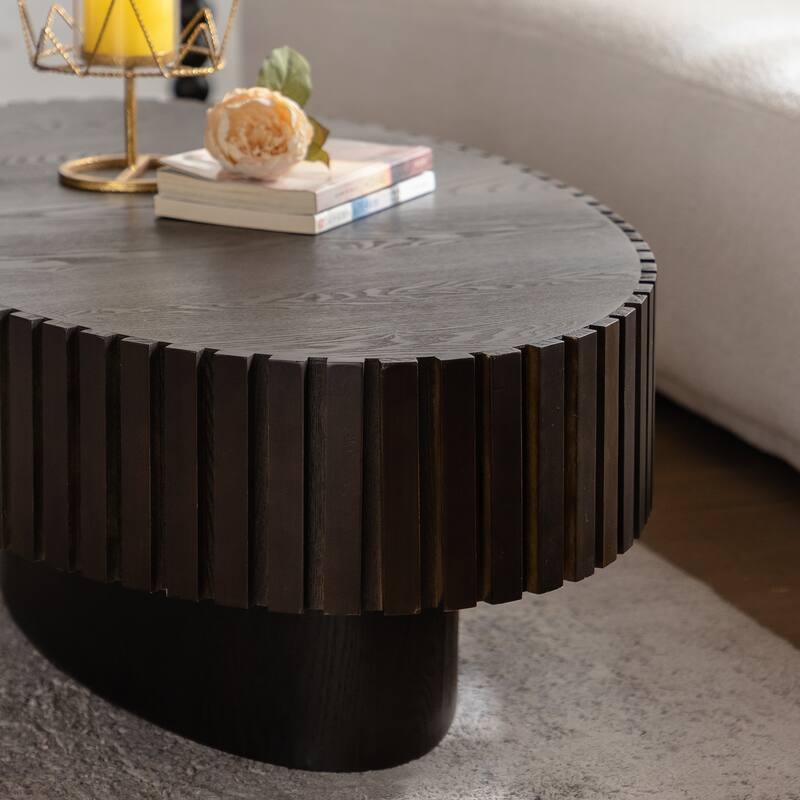 Handcrafted Relief Oval Coffee Table with Sturdy Pedestal