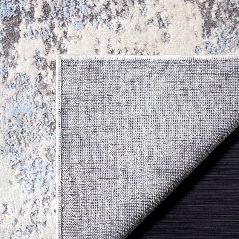 SAFAVIEH Lagoon Irmtraud Modern Abstract Polyester Area Rug