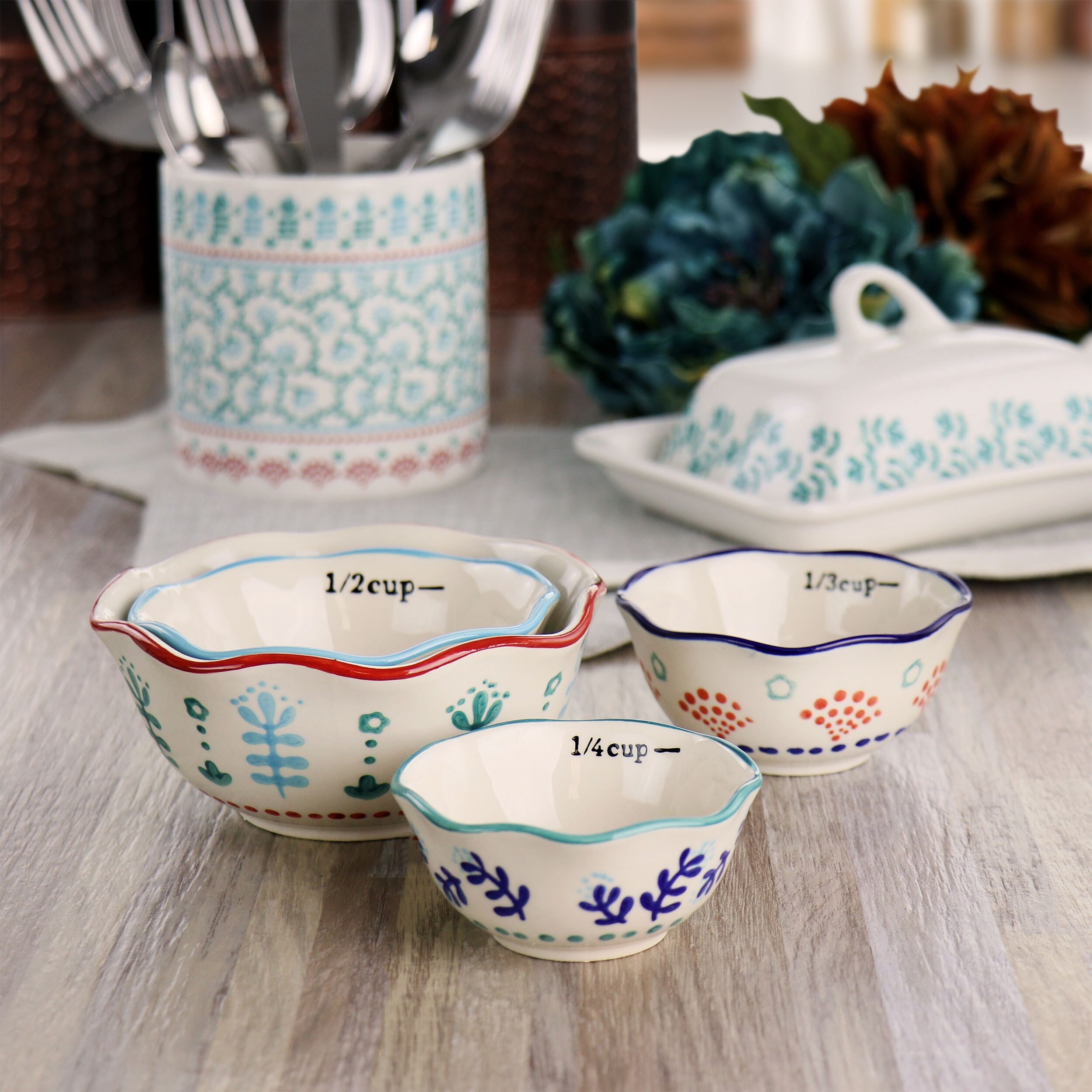 https://ak1.ostkcdn.com/images/products/is/images/direct/8089d91ae6f223ee7dd85fb3e337ca94cf8017f1/Gibson-Home-Village-Vines-4-Piece-Stoneware-Measuring-Cup-Set.jpg