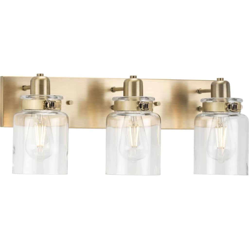 Calhoun Collection Three-Light Vintage Brass Clear Glass Farmhouse Bath Vanity Light - 21.625 in x 6.875 in x 8.625 in